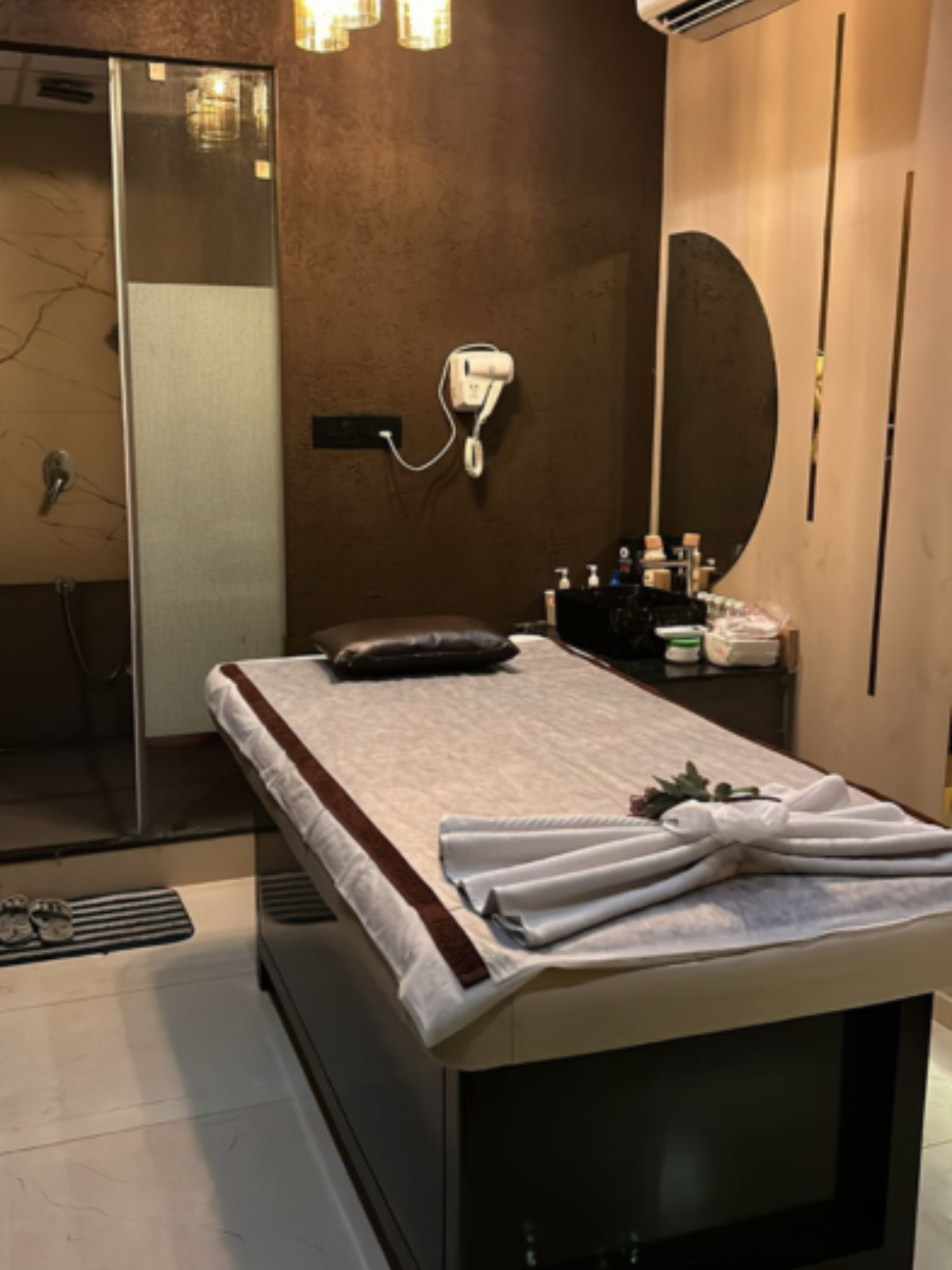 Modern spa room at Spa Empirewith soft lighting and comfortable massage tables