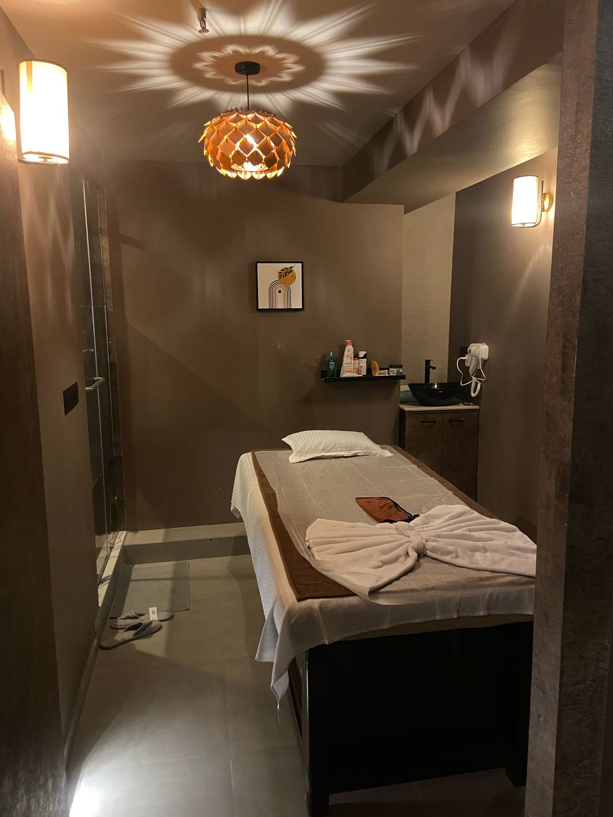 Modern spa room at Spa Empirewith soft lighting and comfortable massage tables